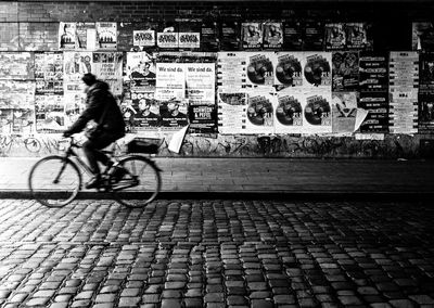 Bicycle on cobblestone street in city