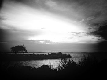 Scenic view of sea at sunset