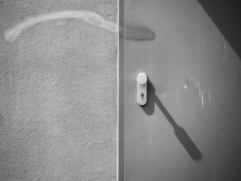 Close-up of door handle on wall