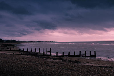 Scenic view of sea against sky at sunset