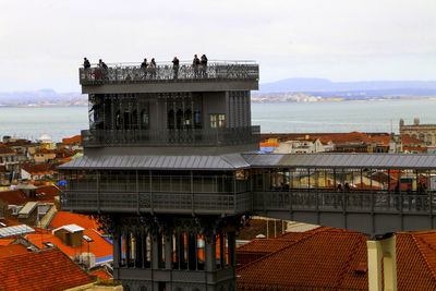 View of cityscape against sea