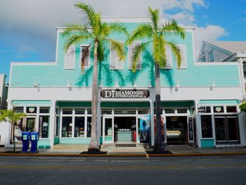 Exterior of building by street against sky