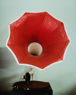 Close-up of red lamp on wall