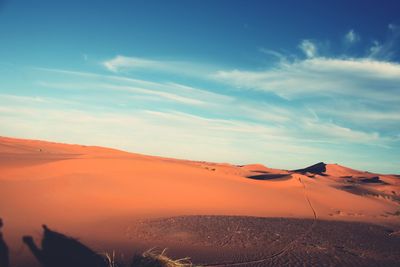 Scenic view of desert against sky