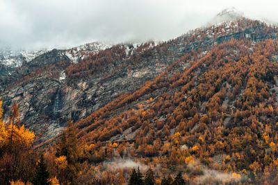 Scenic view of mountains against sky during autumn