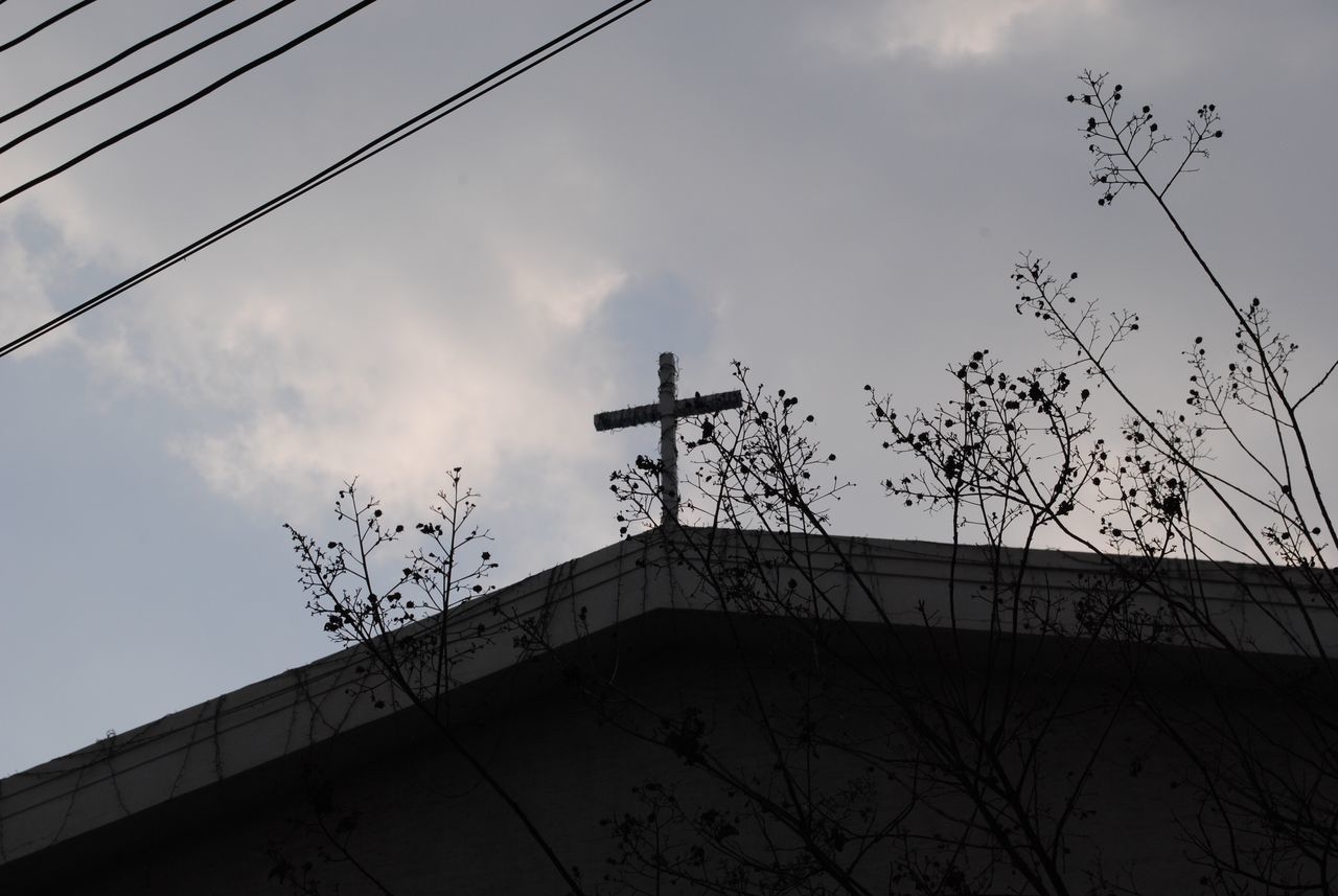 LOW ANGLE VIEW OF POWER LINE AGAINST SKY