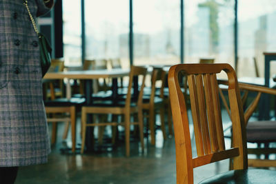 Empty chairs and table in restaurant