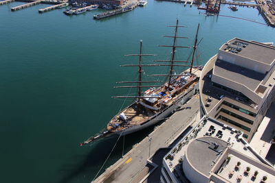 High angle view of boats moored at harbor