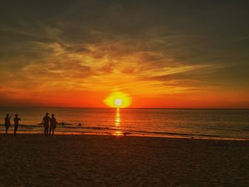 Scenic view of sea at sunset