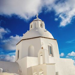 Low angle view of white building against sky