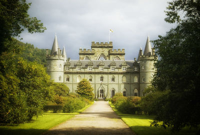 View of historical building against cloudy sky