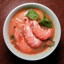 High angle view of fish in bowl on table