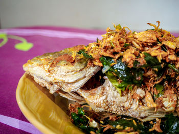 Close-up of meal served on table