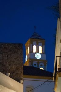 High section of church against blue sky