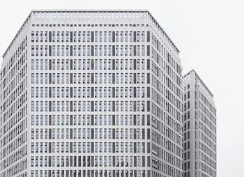 Low angle view of modern buildings against clear sky