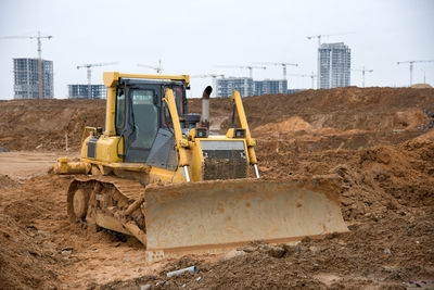 Dozer for pool excavation and utility trenching. bulldozer during land clearing and foundation 