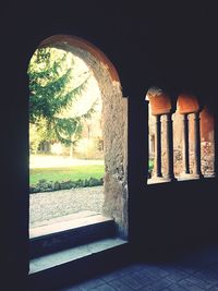 View of historic building seen through window