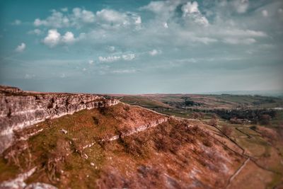 High angle view of land against sky