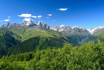 Mountains range with mount ushba