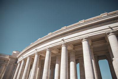 Low angle view of building against clear blue sky