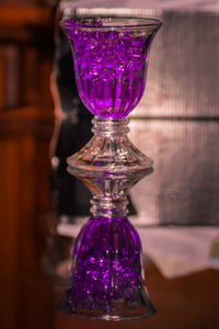 Close-up of wine glass on table