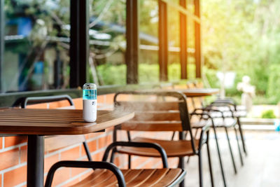 Empty chairs and table at cafe