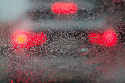 Full frame shot of snow on car windshield