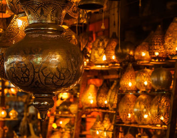 Close-up of illuminated lamp in building