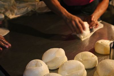 Midsection of person preparing food