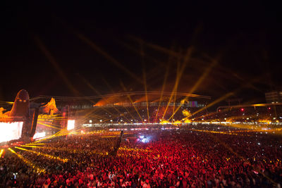 Panoramic view of crowd at music concert