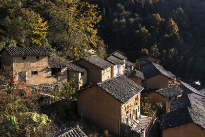 Overlooking the steep ancient mountain village facing the sun in autumn