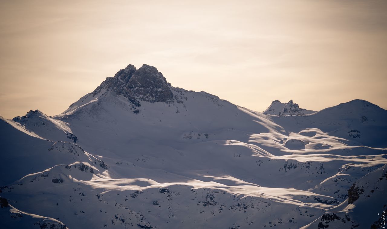 mountain, cold temperature, snow, winter, beauty in nature, scenics - nature, sky, tranquility, snowcapped mountain, tranquil scene, mountain range, non-urban scene, landscape, mountain peak, environment, white color, no people, nature, cloud - sky, formation