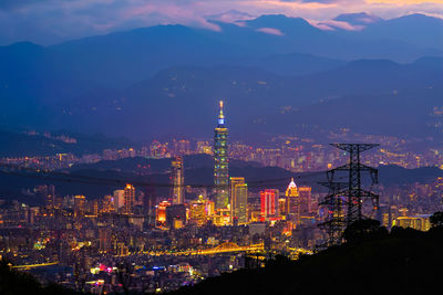 High angle view of illuminated buildings in city