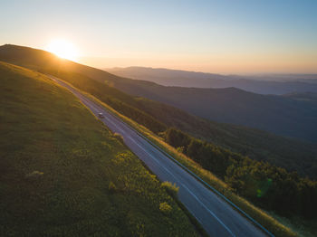 Scenic view of landscape against sky during sunset