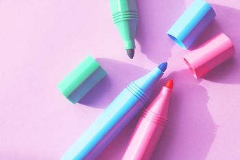 High angle view of colorful felt tip pens on table