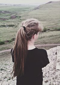 Woman standing on landscape