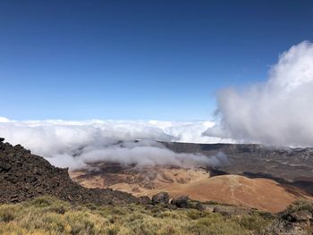 Scenic view of volcanic landscape against sky