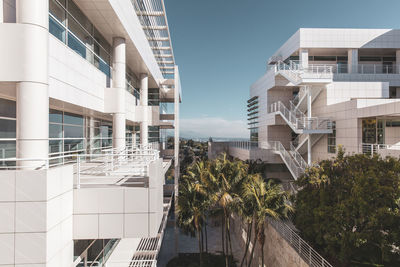 Modern buildings against sky in city