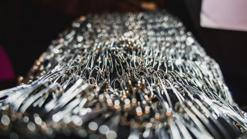 Close-up of metal container on table