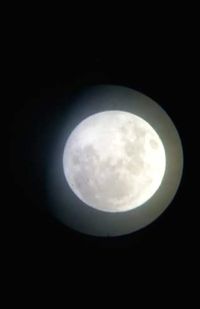 Scenic view of moon against dark sky