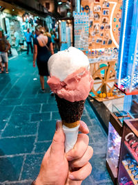 Man holding ice cream cone