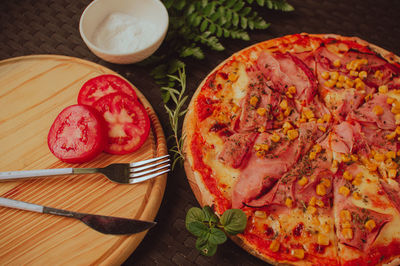 High angle view of pizza on table