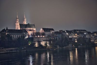 Illuminated buildings in city at night