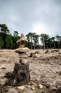 Stack of rocks against sky