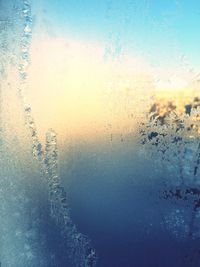 Close-up of water drops on window