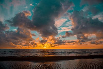 Scenic view of sea against sky during sunset