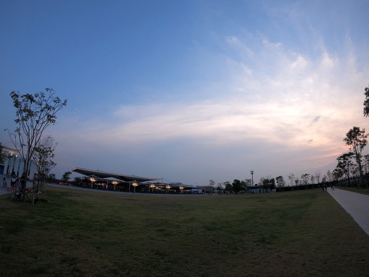 sky, architecture, cloud - sky, building exterior, built structure, nature, plant, tree, sunset, building, no people, transportation, land, scenics - nature, environment, landscape, city, field, mode of transportation, beauty in nature, outdoors