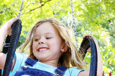 Portrait of smiling girl in playground