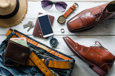 Directly above shot of personal accessories on table