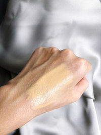 Close-up of hand holding hands